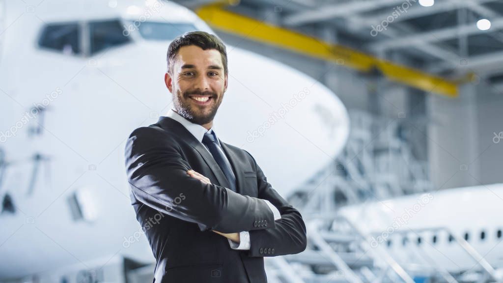 Portrait of Businessman in Aircraft Maintenance Terminal