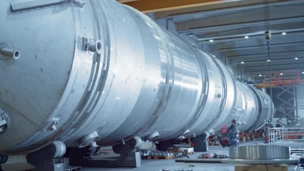 Heavy Industry Manufacturing Facility / Factory where Large Diameter Pipe is Being Assembled. Modern Industrial Manufacturing Technology to Design and Construct Oil, Gas and Fuels Transport Pipeline. Moving Dolly Camera Shot — Stock Video