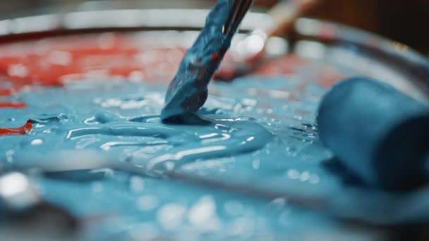 Close-up Industrial Artist Mixes Paints with a Paint Brush in the Palette. Renovation Work in Progress, Choosing of Colors — Stock Video