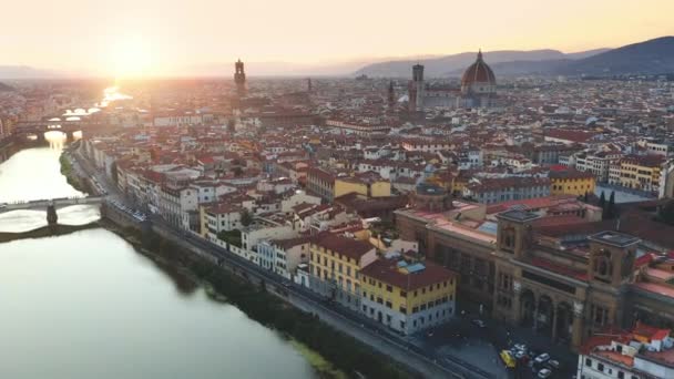 Aerial Drone View: Historically and Culturally Rich Italian Town on the Sunny Day. Beautiful Old City With Medieval Churches and Cathedrals. River Runs through the City — Stock Video