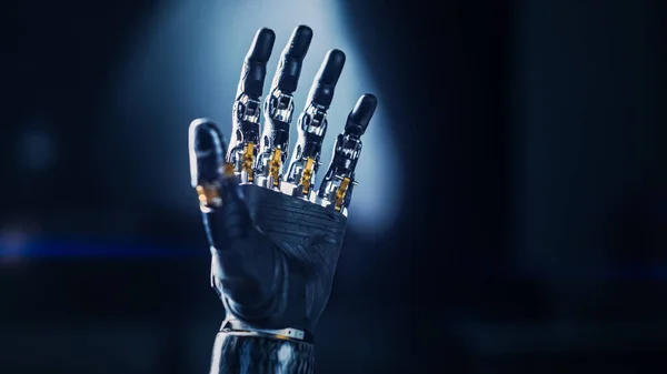 Современная рабочая рука робота-гуманоида. Тонкое механистическое чудо, высокотехнологичный протез, помогающий людям с ограниченными возможностями, потерявшим руку в результате несчастного случая — стоковое фото