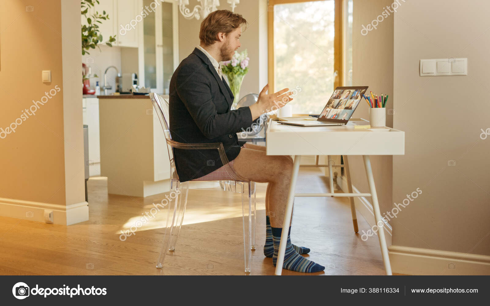 Funny Shot: Businessman Wearing Jacket and No Pants Uses Laptop