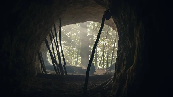 Shot Made Out of the Cave into Prehistoric Forest (en inglés). Lugar de vida de Neanderthal con herramientas y palos de piedra primitivos . — Foto de Stock