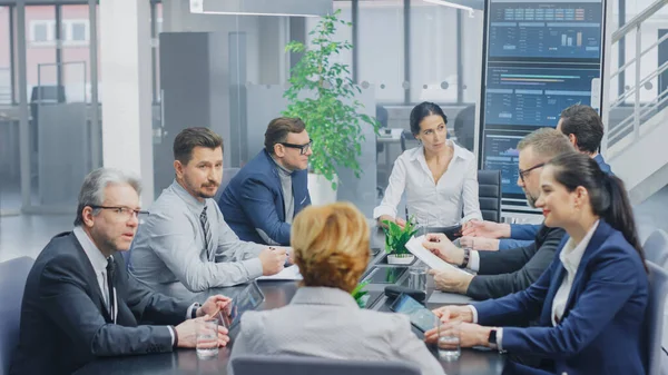 In the Modern Corporate Office Meeting Room: Diverse Group of Businesspeople, Lawyers, Executives and Members of the Board of Directors Talking, Negotiating and Working on a Winning Strategy. — Stock Photo, Image