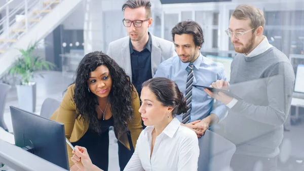 In Modern Office: Diverse Team of Young Motivated Businessmen and Businesswoman Work on Computer, Having Discussion, Finding Problem Solution Collectively. Ambitious Businesspeople Successful Teamwork — Stock Photo, Image