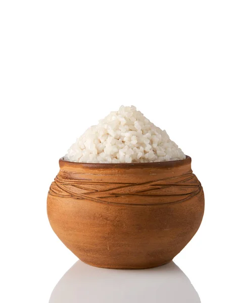 Brown pot with a slide of rice isolated on white — Stock Photo, Image