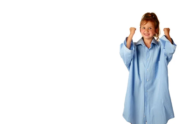 Cute girl in a big shirt is making a masseur and threatening with fists isolated on white — Stock Photo, Image