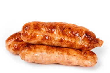 Meat sausages with glitter on a light background. Fried sausage. The concept of traditional cuisine.