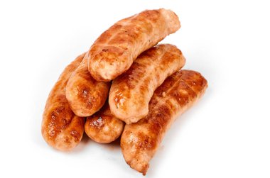 Meat sausages with glitter on a light background. Fried sausage. The concept of traditional cuisine.