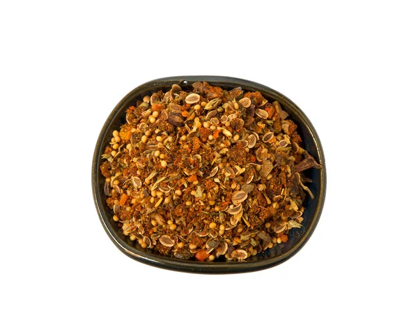 Keveréke fűszerek egy tálba izolált fehér alapon. Spice az izolátum. Megtekintés felülről. — Stock Fotó