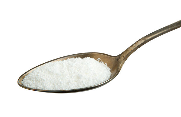 Цитриковая кислота в ложке изолирована на белом фоне. Вид сверху
.