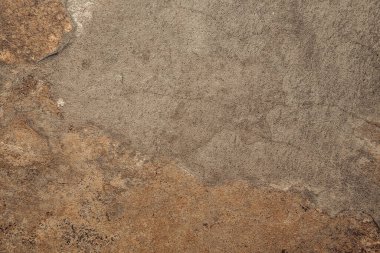 Kusursuz kahverengi beton doku. Taş duvar arka planı. Duvara soyut çizimler