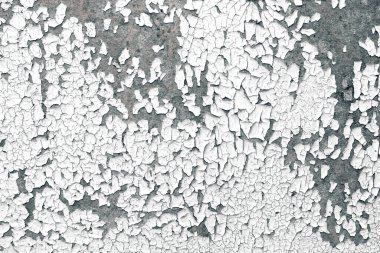 Eski çatlak boya dokusu. Siyah yüzeyde beyaz boya.