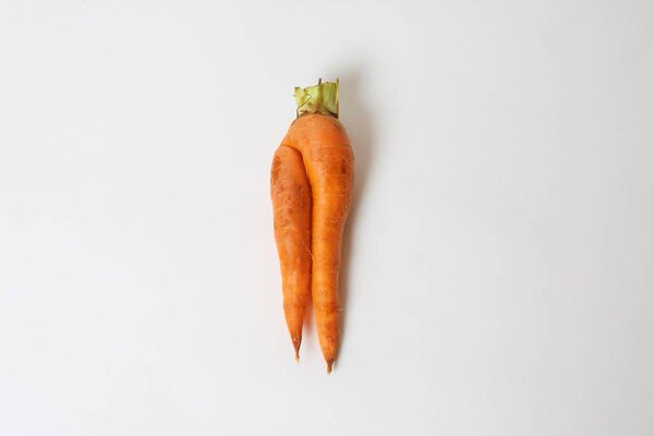 Trendy Ugly Vegetable Carrot Isolated On White.