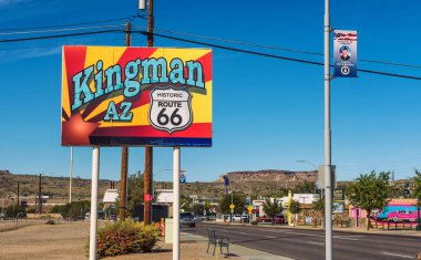 Welcome to Kingman street sign located on historic route 66 clipart