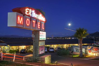 El Trovatore Motel on Route 66 in Kingman, Arizona, at night clipart