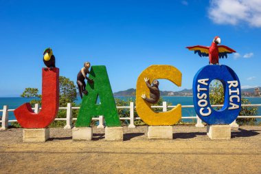 Colorful entry Sign for the city of Jaco in Costa Rica clipart