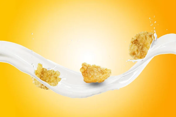 Cornflakes Mit Milchspritzer Als Hintergrund lizenzfreie Stockbilder