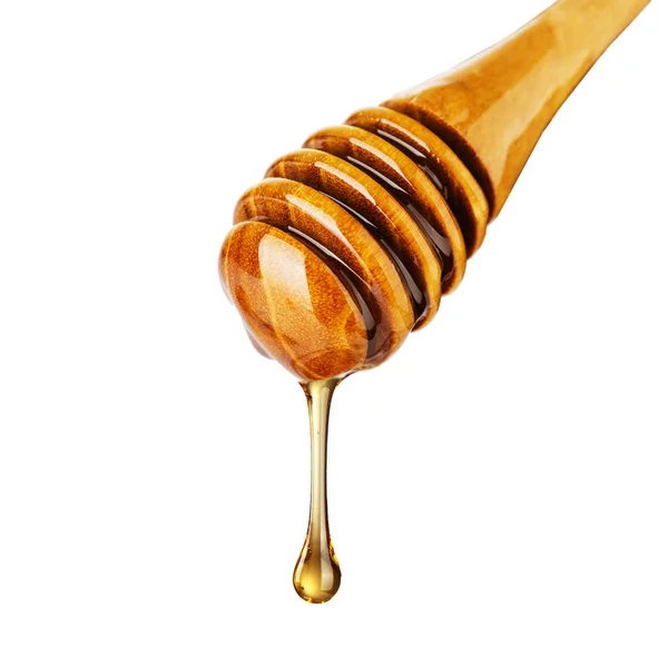 Gotejamento de mel no branco Imagens De Bancos De Imagens