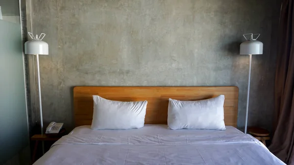 Bedroom interior with cement walls