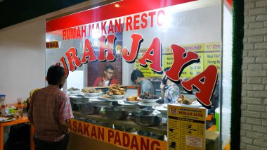 9 September 2020, Semarang, Indonesia: Warung Nasi Padang, Padang rice curry one of the most famous meals to be associated with Indonesia, originally from the Padang. Indonesian Culinary Food clipart