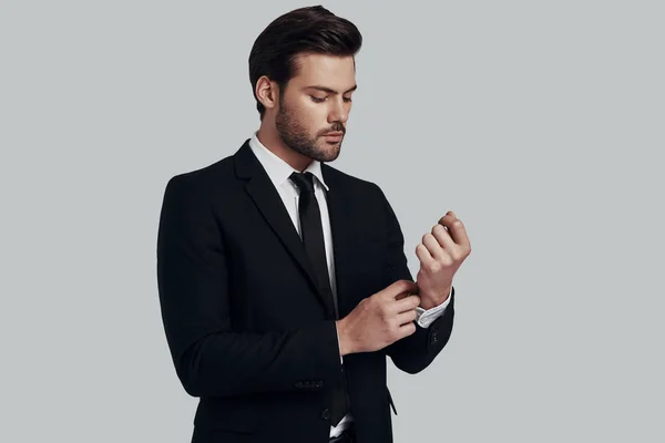 Perfect in every way. Handsome young man in full suit adjusting — Stock Photo, Image