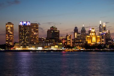 The downtown Philadelphia skylines at sun set clipart