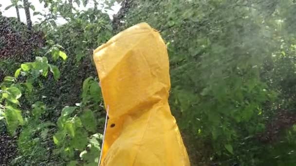 Head Yellow Hood Rain Man Cape Storm Slow Motion — Stock Video