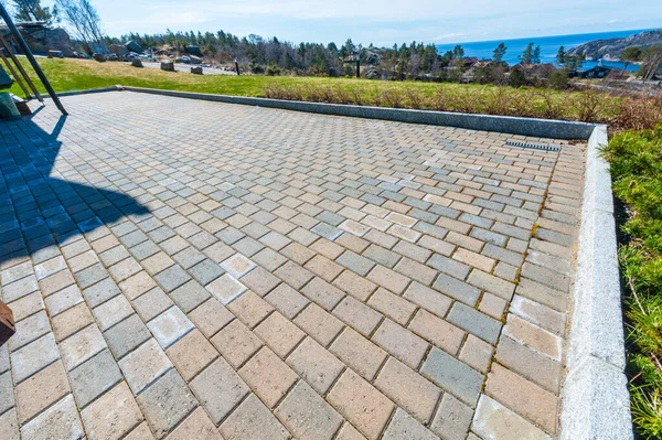 Stone patio outside a house.