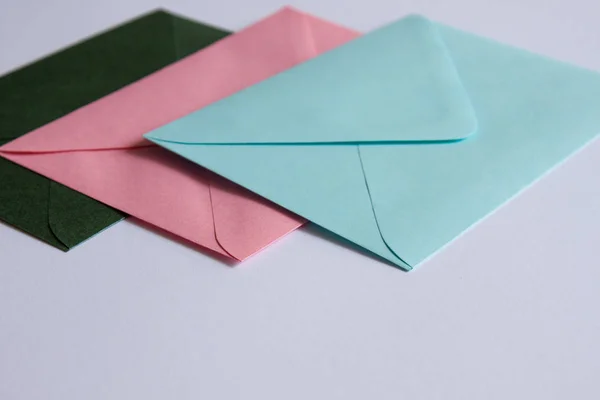 Colorful envelopes and white background. — Stock Photo, Image