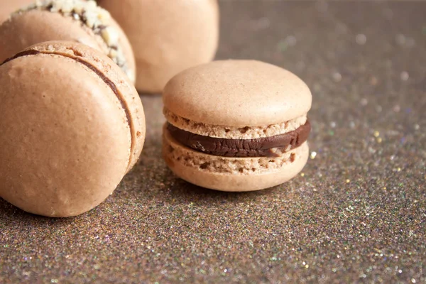 Schokoladenmacarons Hintergrund. — Stockfoto