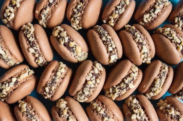 Chocolate macarons background. — Stock Photo, Image