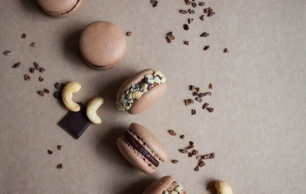 Chocolate macarons background. — Stock Photo, Image