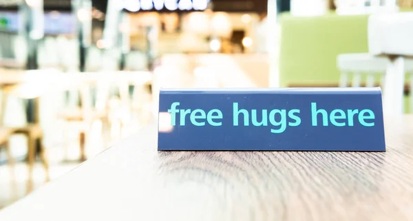 Free hugs sign.