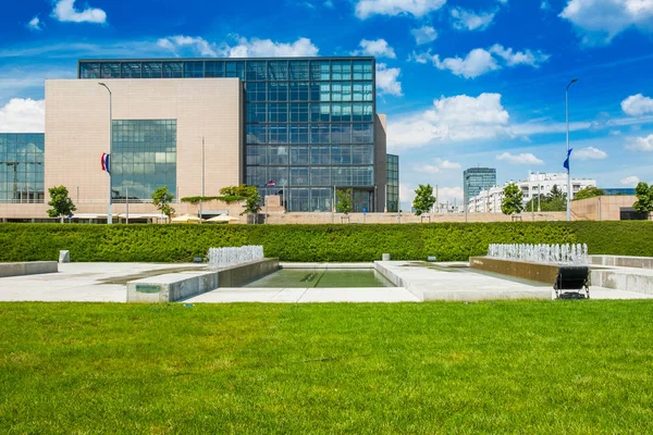 Building of the national and university library in Zagreb, Croatia, modern architecture, glass facade, and new public park.