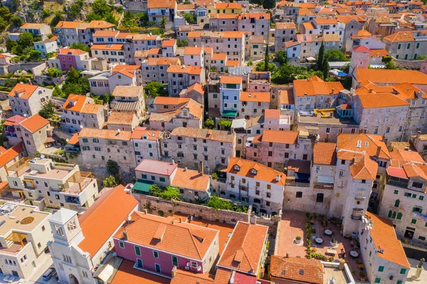 Croatia, city of Sibenik, panoramic view of the old town center, stone houses on hills