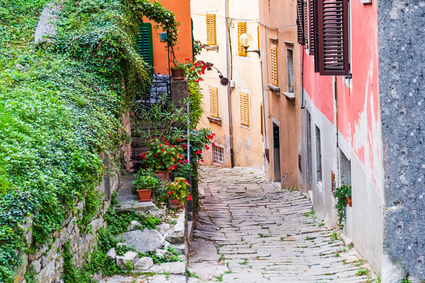 Croatia, Istria, beautiful old cobbled street and traditional houses in the old historical town of Labin