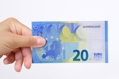 El tutan bir Euro banka notu izole hiçbir arka plan