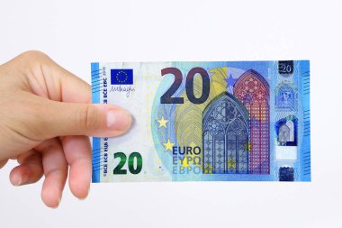 El tutan bir Euro banka notu izole hiçbir arka plan