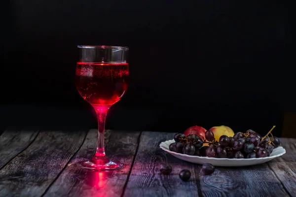 Pink wine. Wine in a glass. Traditional Georgian wine according to ancient technology. Copy space Close-up and horizontal orientation.