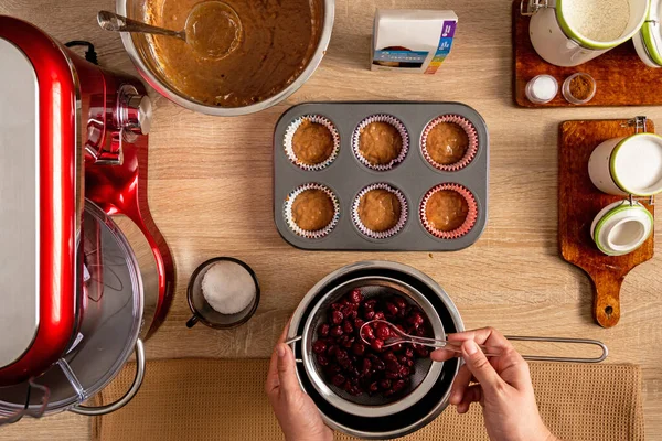 Top view of raw muffin batter in paper cases — Stock Photo, Image