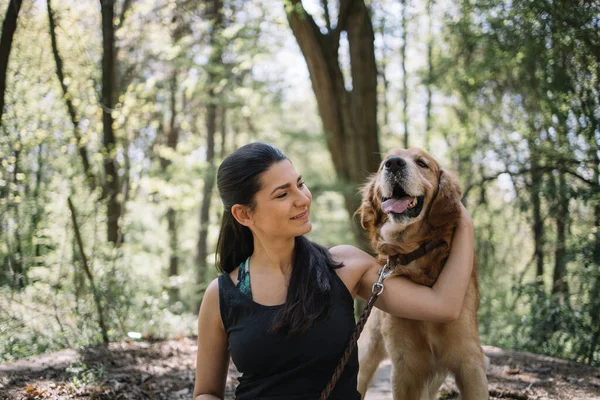 Portrait of smiling girl and happy dog