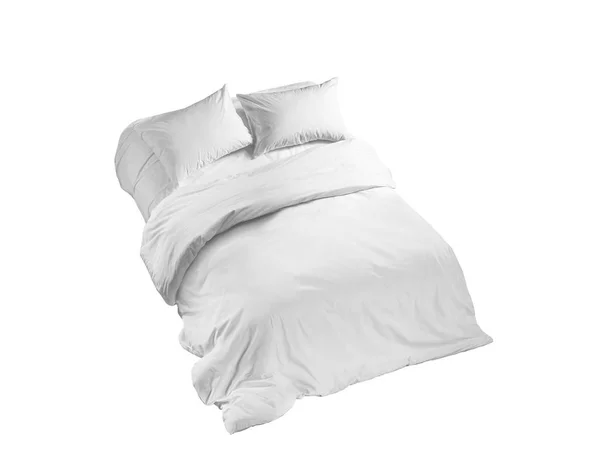 Ropa de cama blanca en una cama aislada, vista superior — Foto de Stock