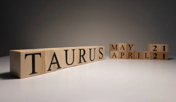 Taurus Word Wooden Cubes White Background Photographed Studio Spot Light — Stock Photo, Image