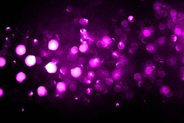 Las luces de Navidad púrpura están fuera de foco . — Foto de Stock