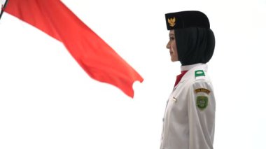 Genç bayan Endonezya Ulusal Bayrak Kaldırma Birliği. Ulusal Paskibraka Konseyi.