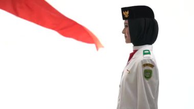 Genç bayan Endonezya Ulusal Bayrak Kaldırma Birliği. Ulusal Paskibraka Konseyi.