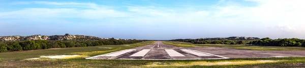 The runway of the airport of the Assumption island in Seychelles.