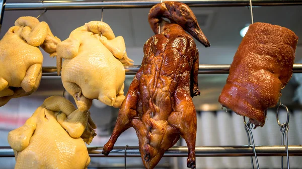 Chinese traditional local food store at china. Roasted duck and pork meat