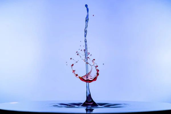 Abstrakter Hintergrund der Farbspritzer Wasser, die Konzeptkunst — Stockfoto